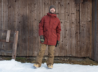 A man in a snowboard jacket and pants